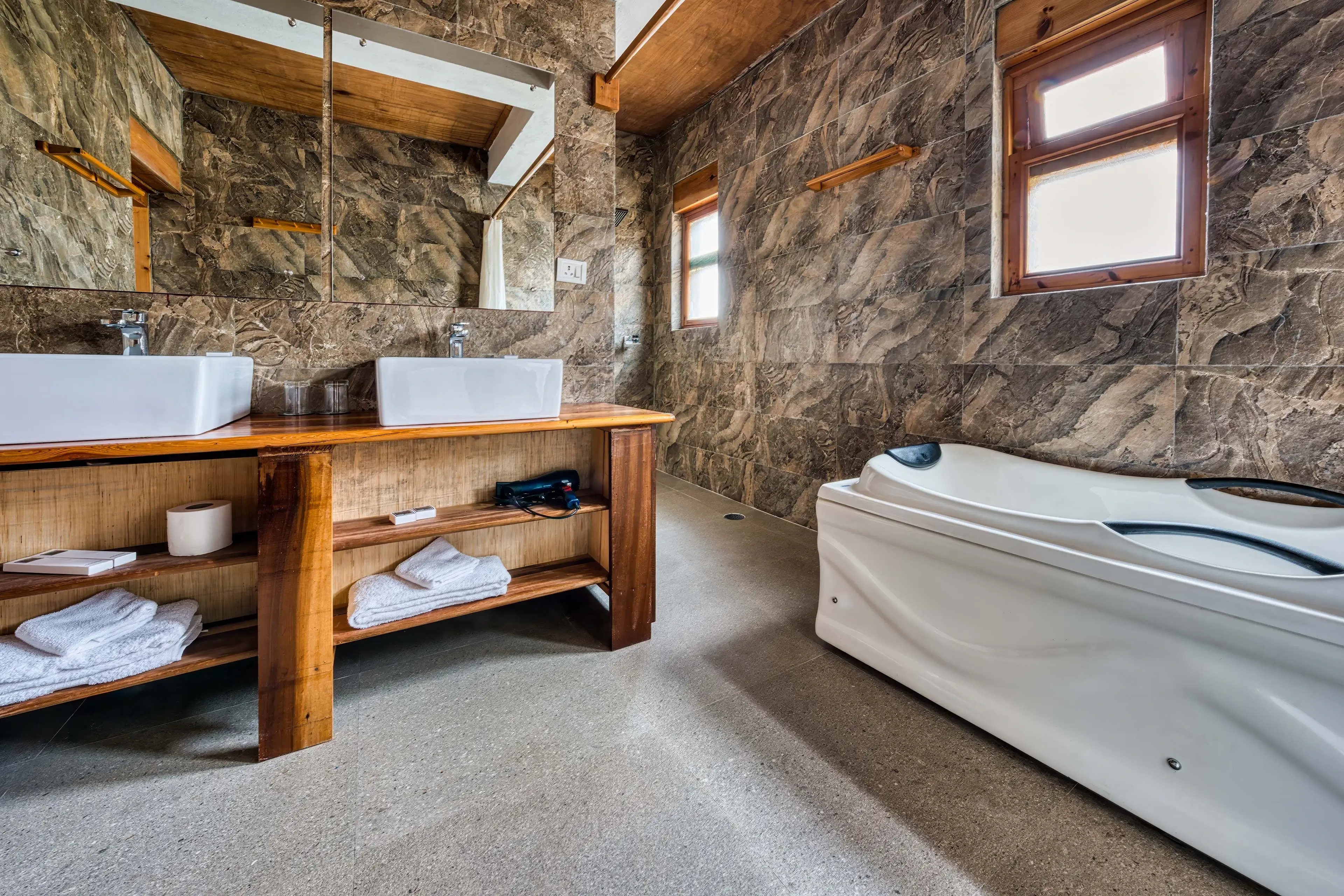 A shot of the faucet and the bathtub